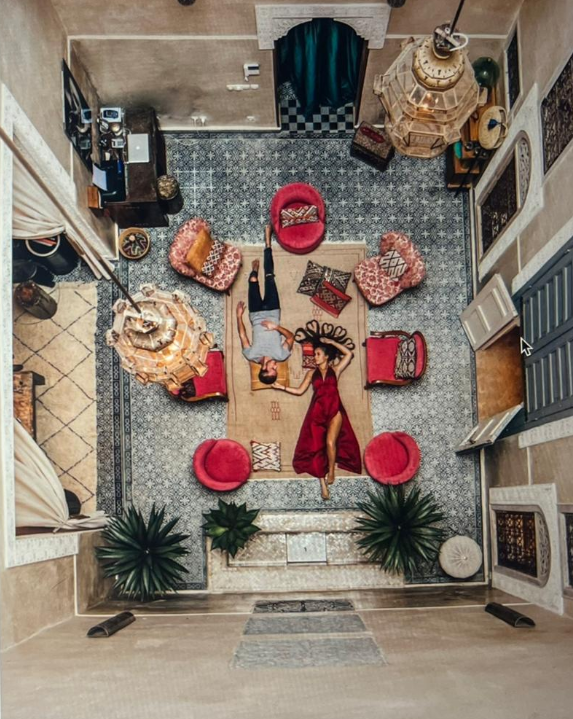 Couple relaxing in the patio of Riad Anata in Fez
